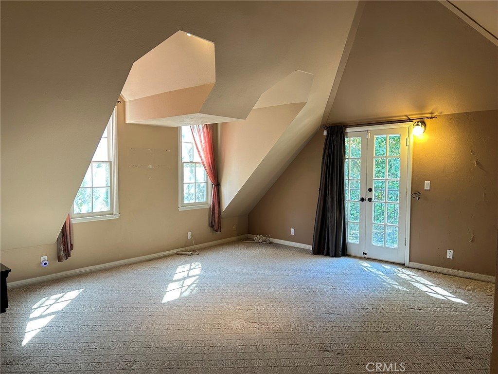 300 South Timken Road Anaheim, CA 92808 - Photo 19 of 40 an empty room with windows and entrance