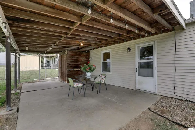 a view of a porch with furniture