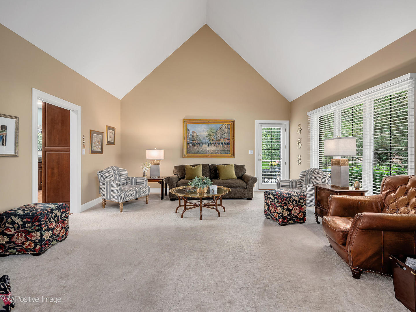 802 Kenmare Drive Burr Ridge, IL 60527 - Photo 21 of 43 a living room with furniture and a large window