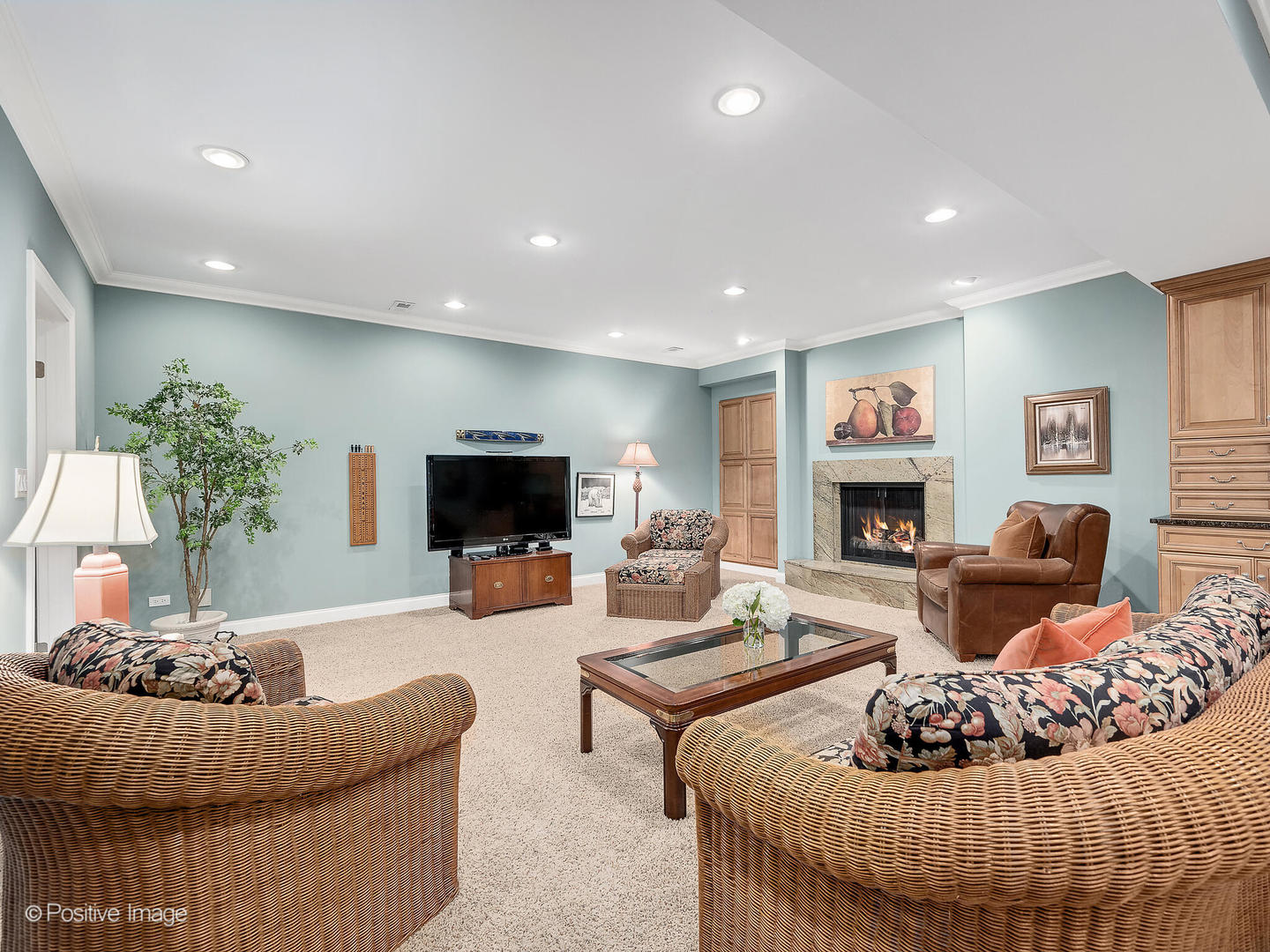 802 Kenmare Drive Burr Ridge, IL 60527 - Photo 35 of 43 a living room with furniture and a fireplace