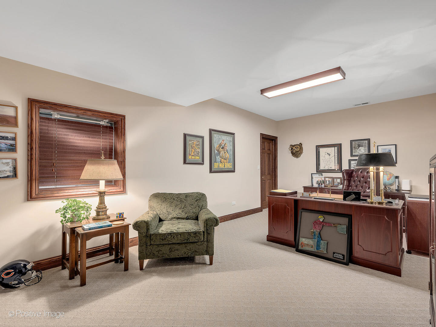 802 Kenmare Drive Burr Ridge, IL 60527 - Photo 38 of 43 a living room with furniture and paintings on the wall