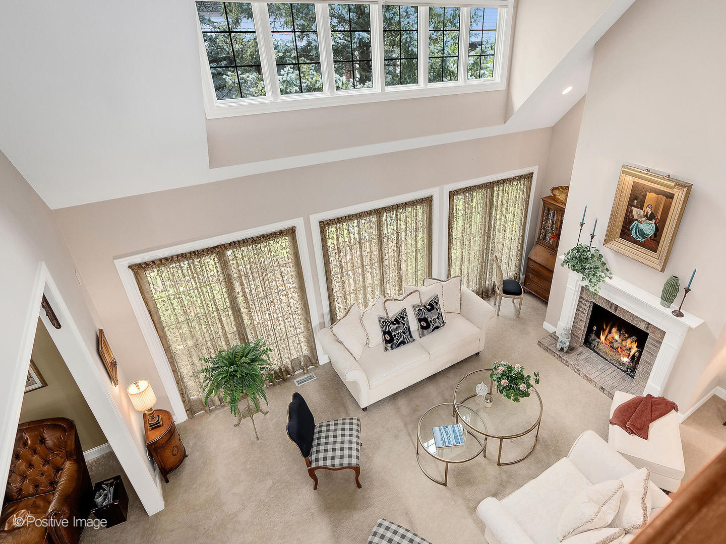 802 Kenmare Drive Burr Ridge, IL 60527 - Photo 7 of 43 a living room with furniture and a fireplace
