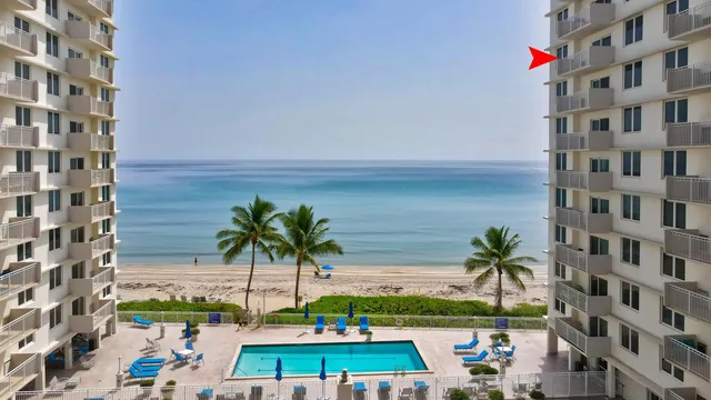 a view of a balcony with an ocean view