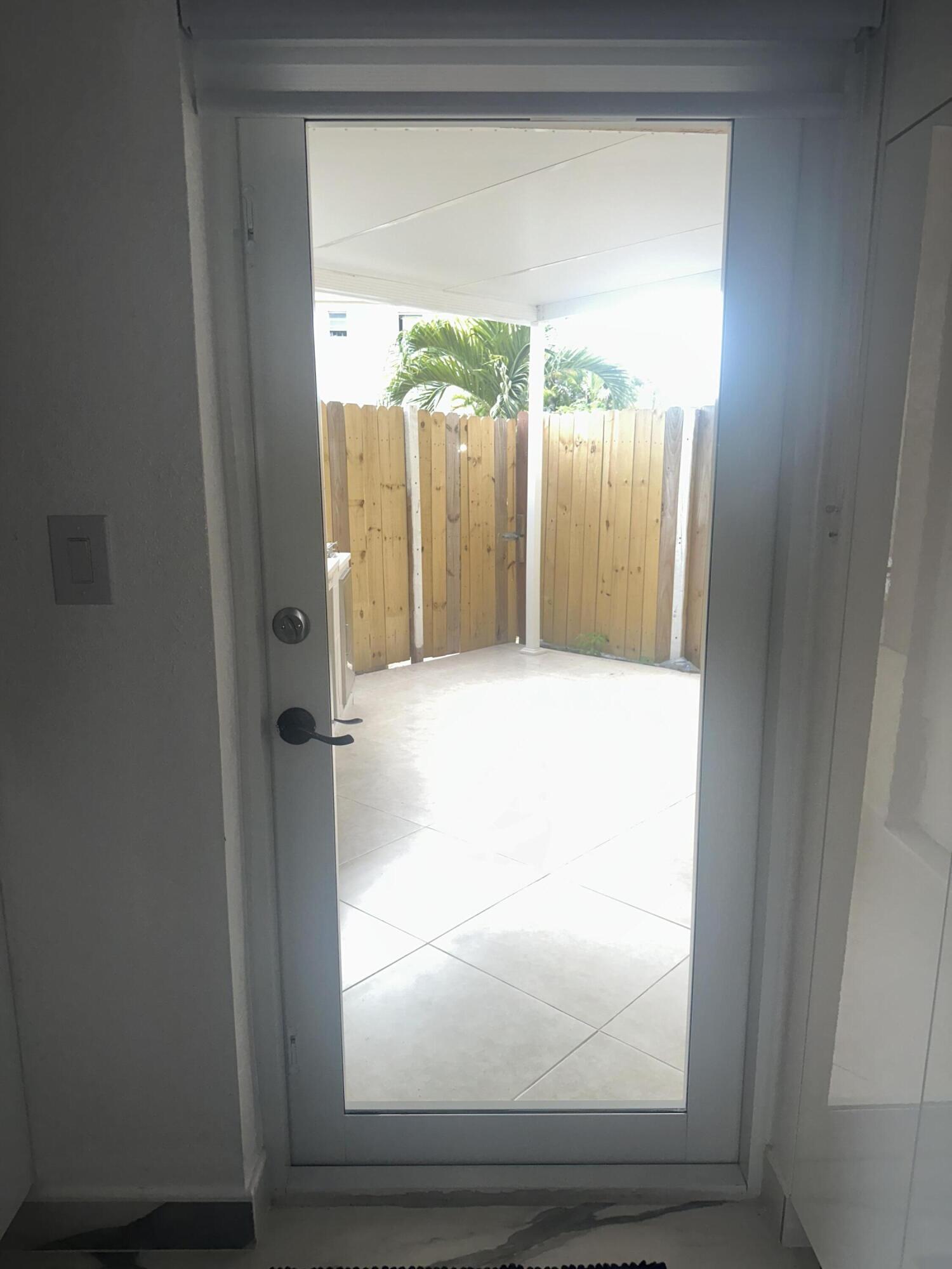 300 East 4th Street, Unit 103 Hialeah, FL 33010 - Photo 23 of 27 Fence patio