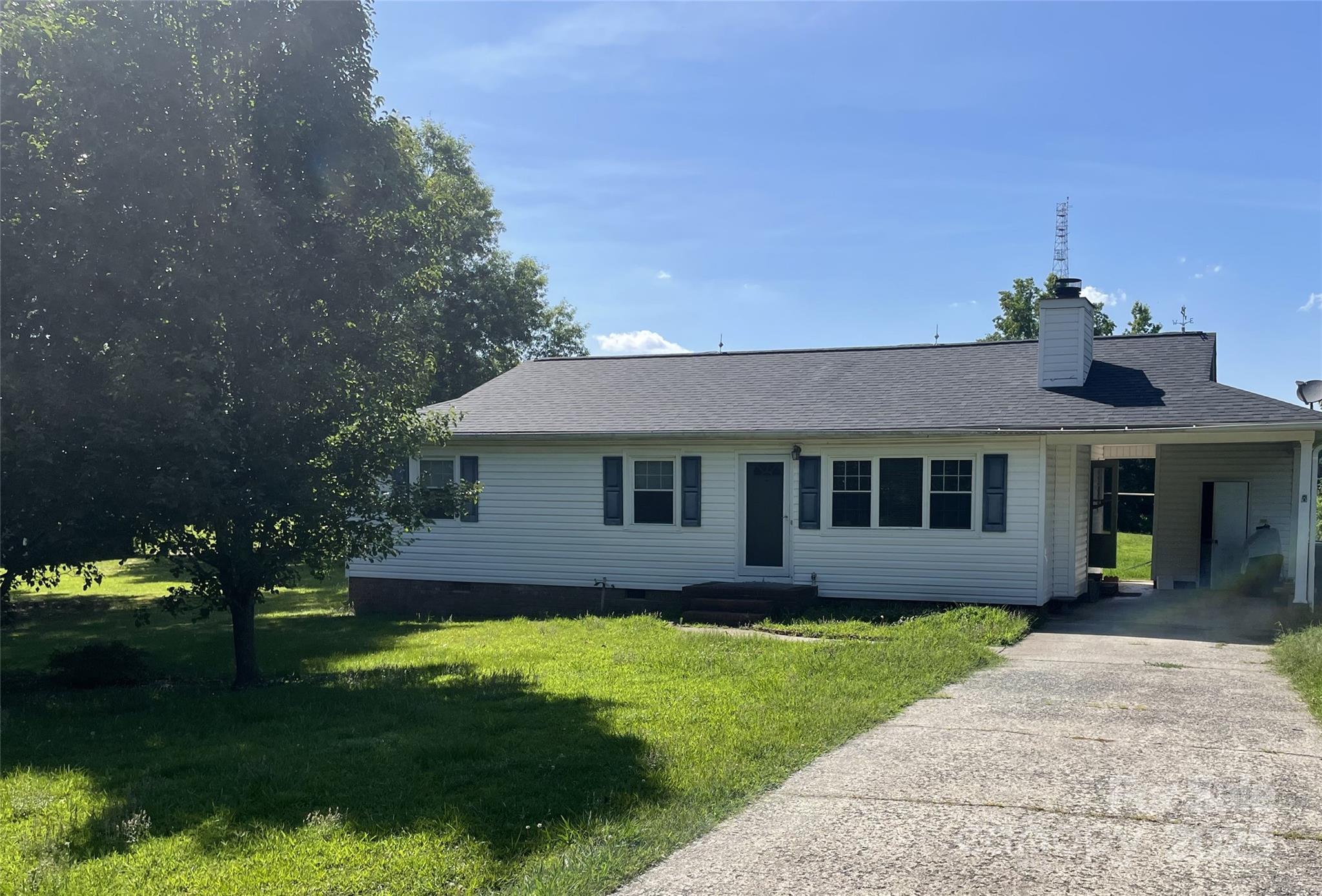 5391 Sapp Road Kannapolis, NC 28083 - Photo 1 of 15 a front view of a house with a garden