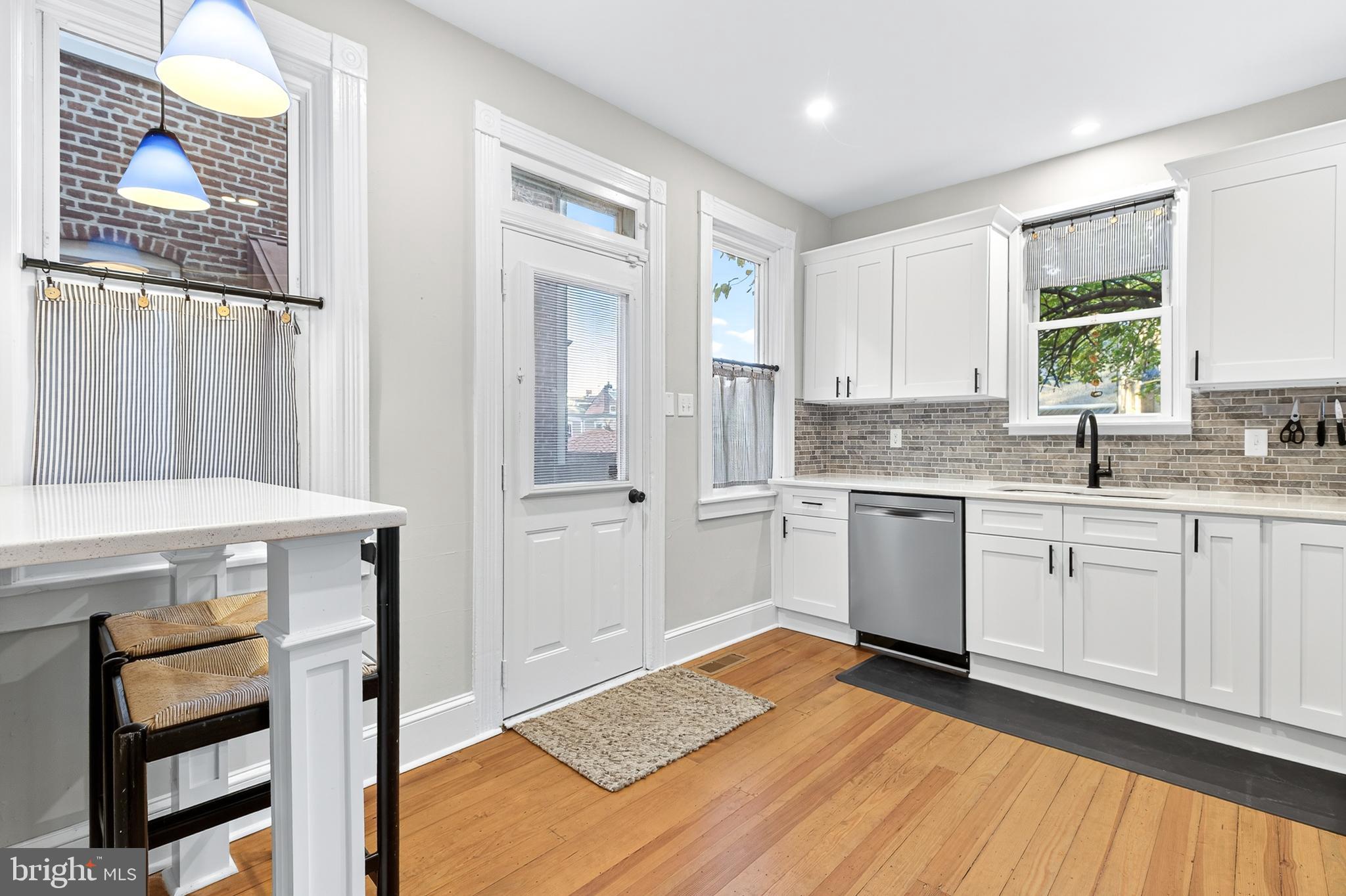 624 St Joseph Street Lancaster, PA 17603 - Photo 15 of 44 a kitchen with a sink cabinets and window