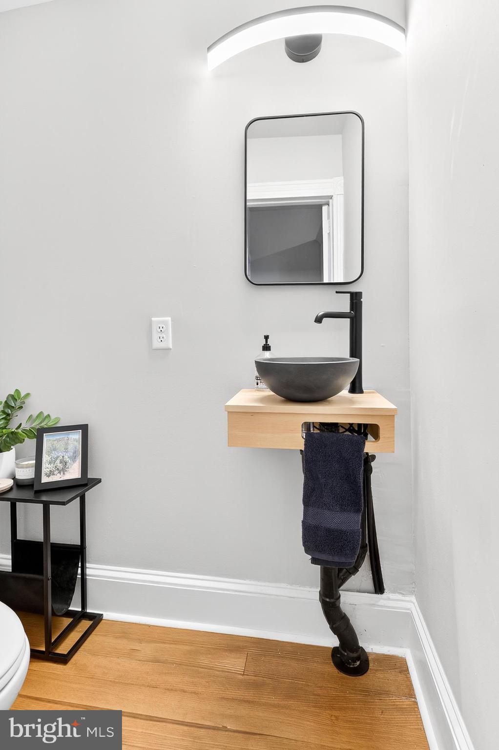 624 St Joseph Street Lancaster, PA 17603 - Photo 19 of 44 a bathroom with a sink and a mirror