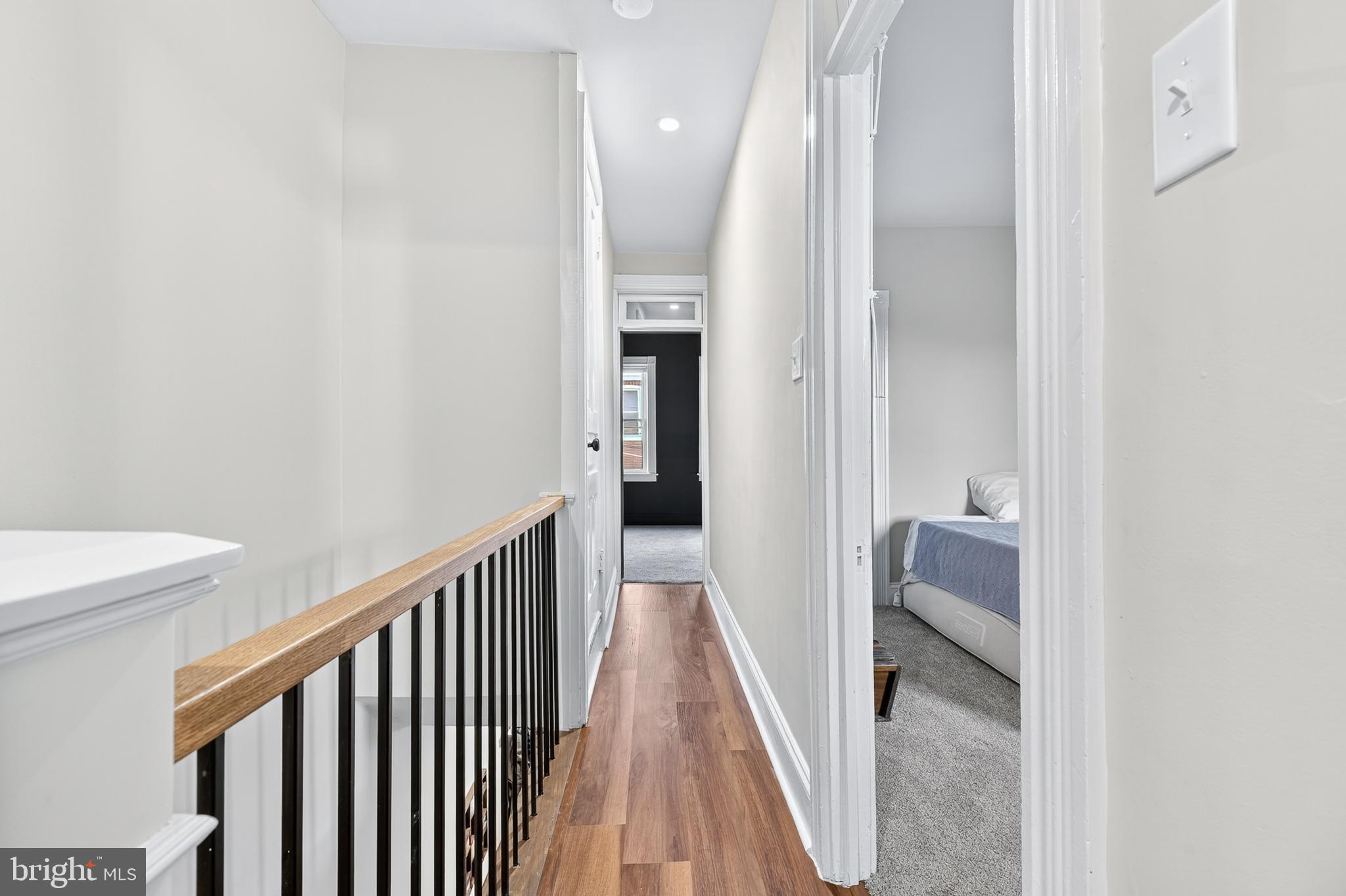 624 St Joseph Street Lancaster, PA 17603 - Photo 22 of 44 a view of a hallway with wooden floor and a bathroom
