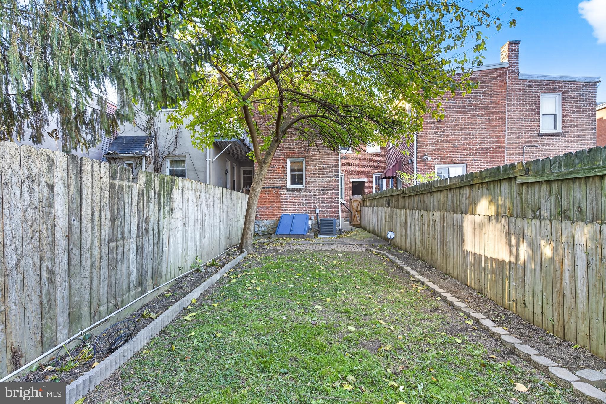 624 St Joseph Street Lancaster, PA 17603 - Photo 40 of 44 a view of a house with a yard next to a lake