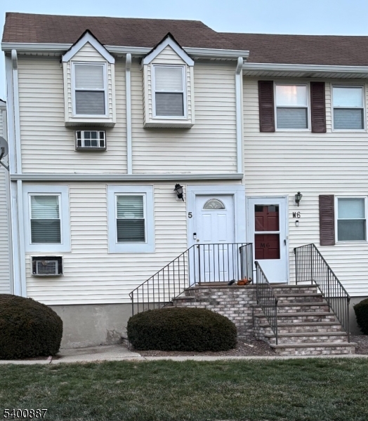 322 M5richard Mine Road, Unit 5 Wharton, NJ 07885 - Photo 1 of 1 a front view of a house with a yard