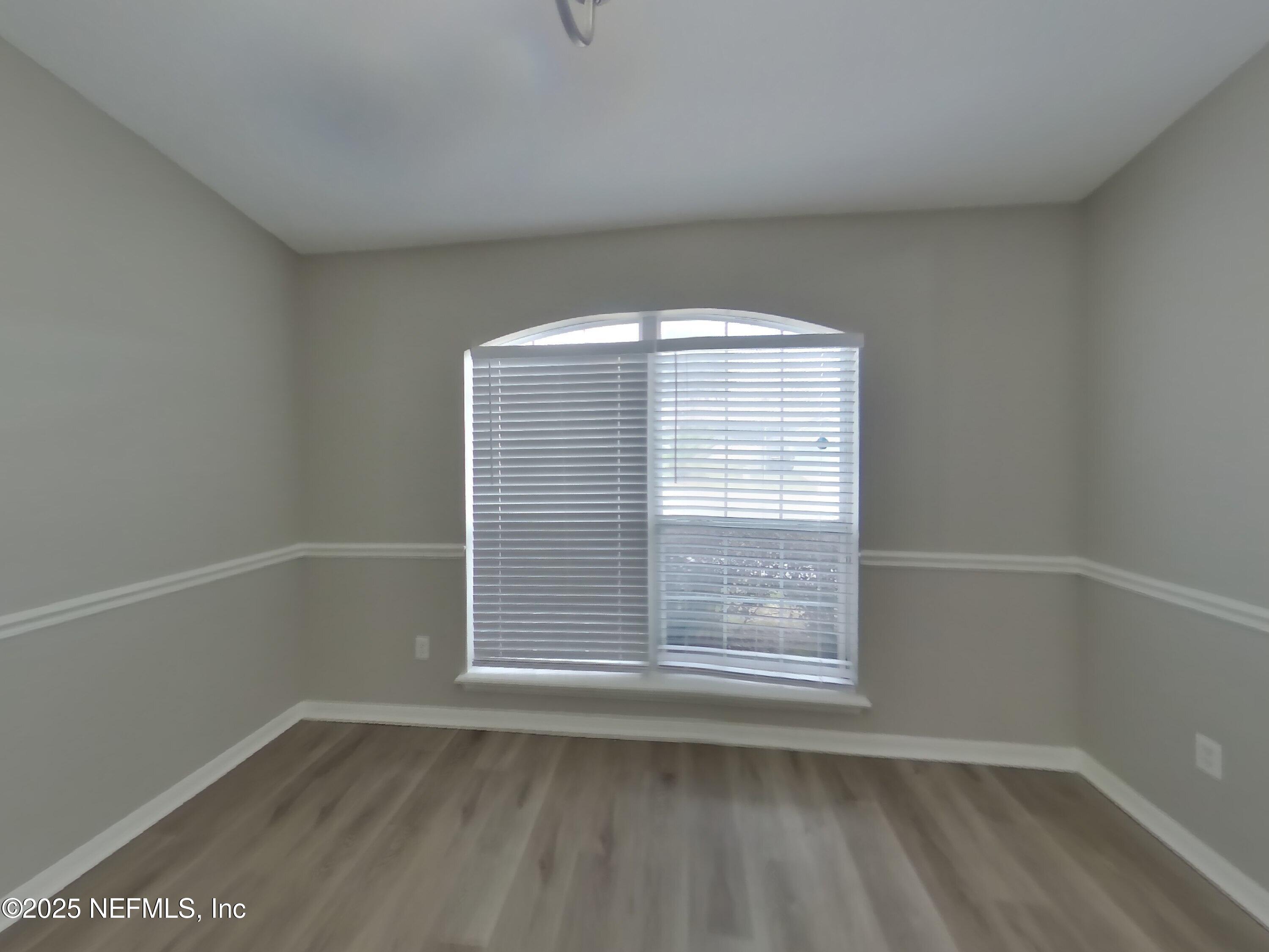 984 Fox Chapel Lane Jacksonville, FL 32221 - Photo 4 of 15 a view of an empty room with a window