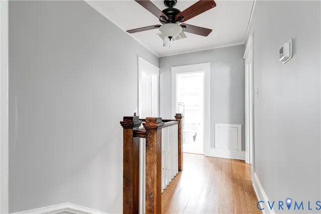 a view of a hallway with a chandelier