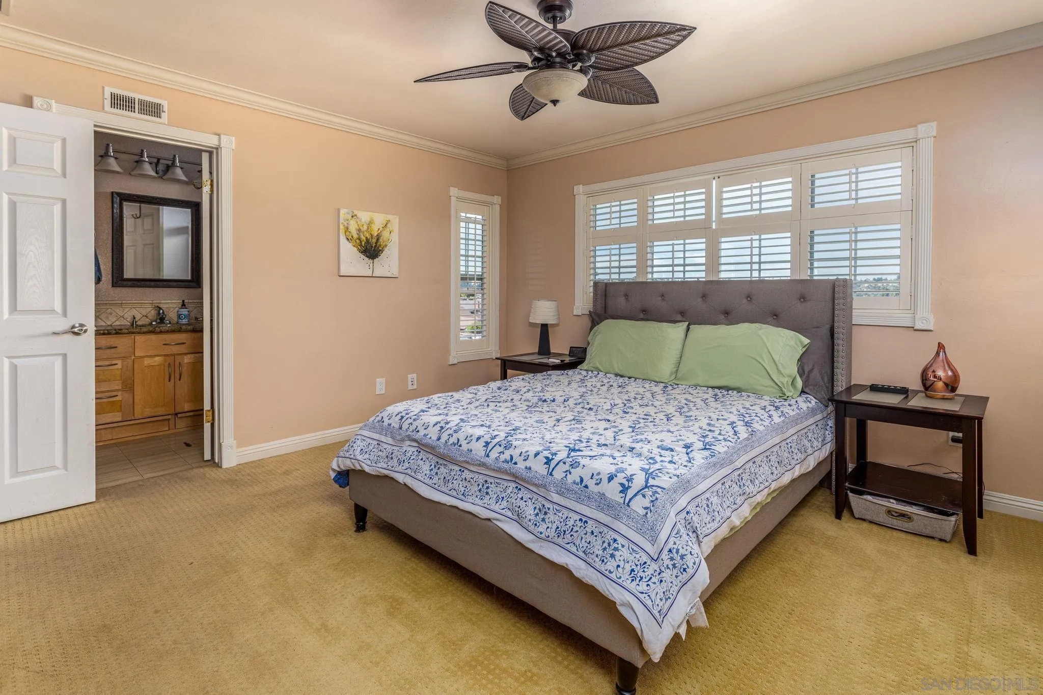 532 Kempton Street Spring Valley, CA 91977 - Photo 21 of 30 a bedroom with a bed and window