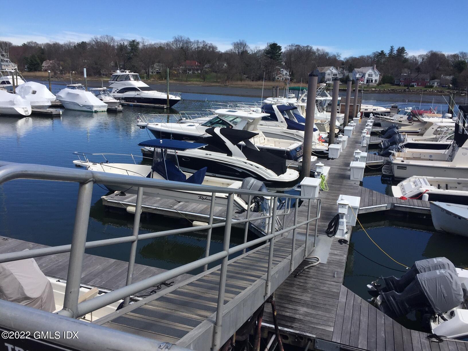 7 River Road, Unit BOAT SLIP E12 Cos Cob, CT 06807 - Photo 3 of 3 a view of a lake with sitting area