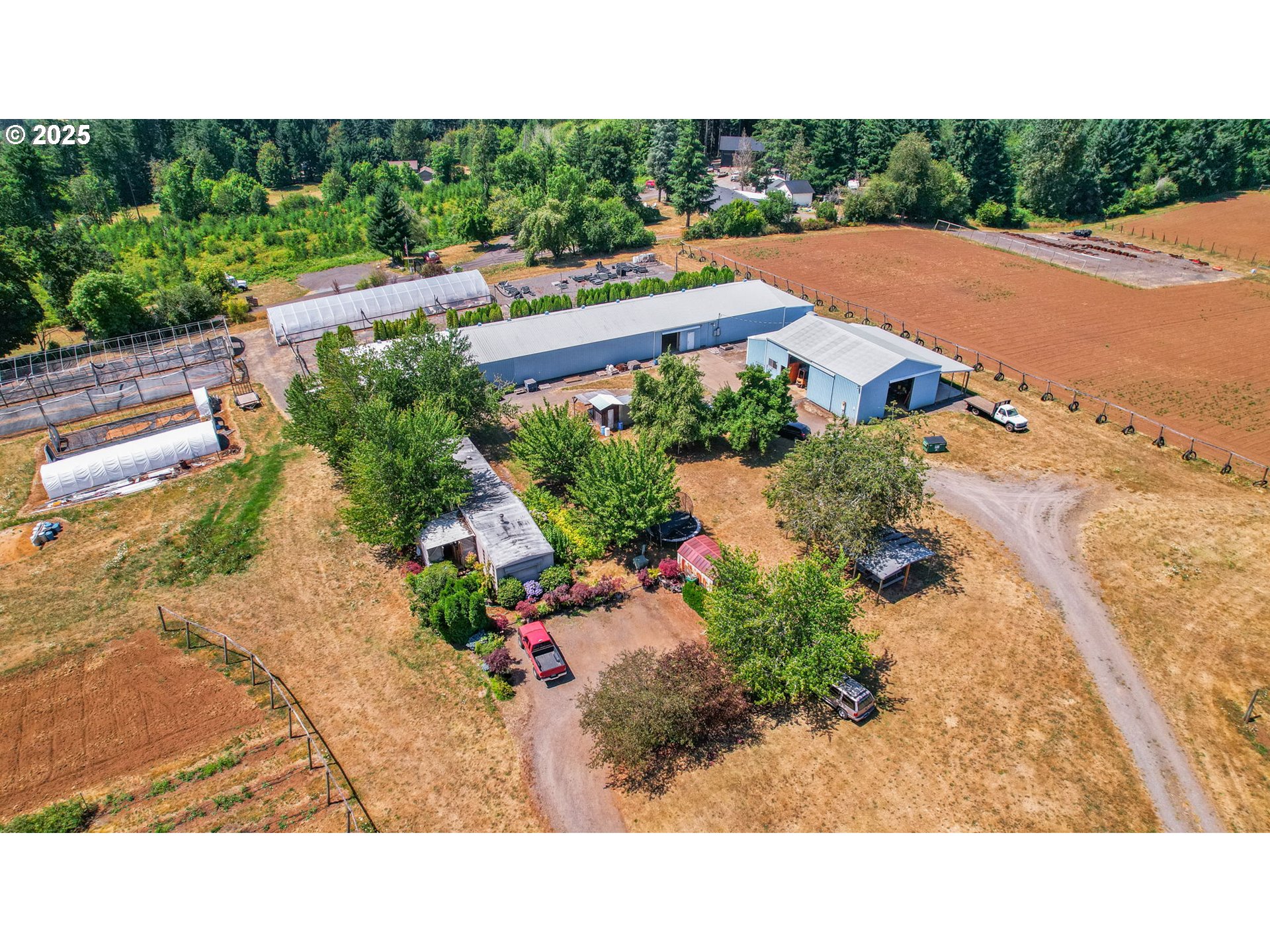 31909 Highway 211 Eagle Creek, OR 97022 - Photo 15 of 48 a picture of a house with a yard