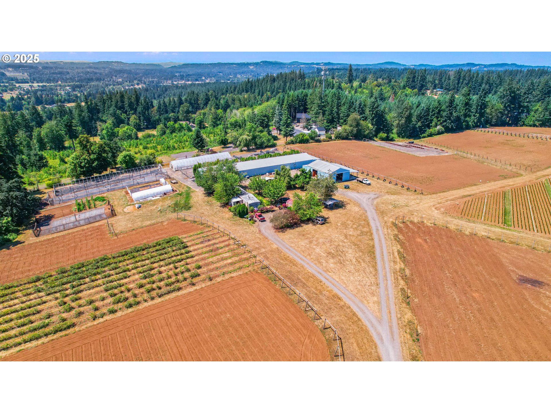 31909 Highway 211 Eagle Creek, OR 97022 - Photo 25 of 48 a view of a street with a yard