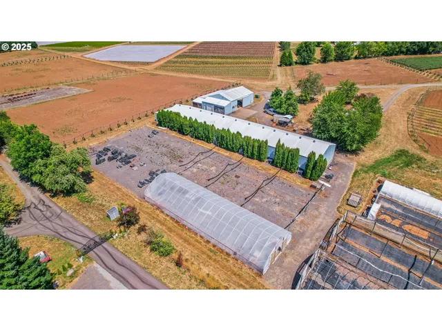 a view of a living room and kitchen