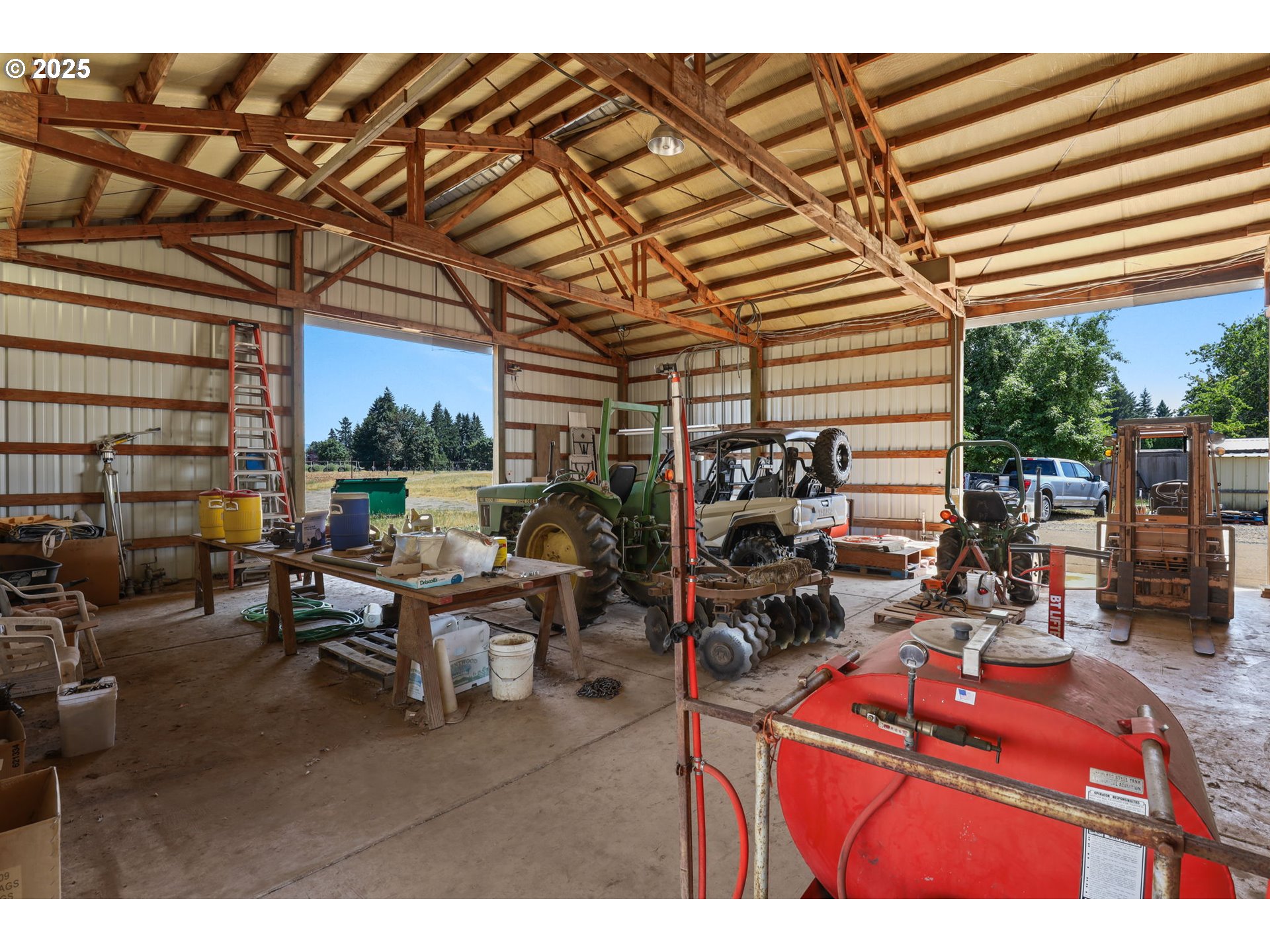 31909 Highway 211 Eagle Creek, OR 97022 - Photo 42 of 48 a roof deck with table and chairs