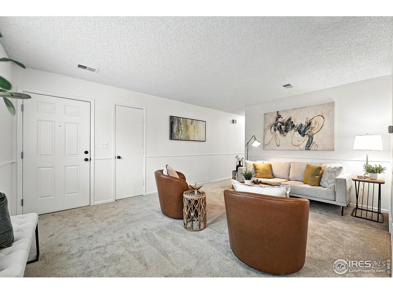 9857 Lane Street Thornton, CO 80260 - Photo 11 of 38 a living room with furniture