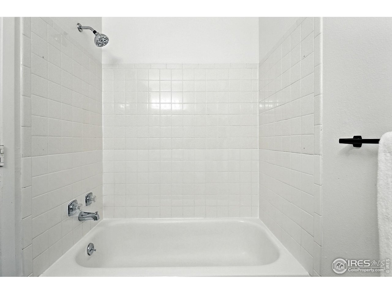 9857 Lane Street Thornton, CO 80260 - Photo 27 of 38 a bathroom with a bathtub