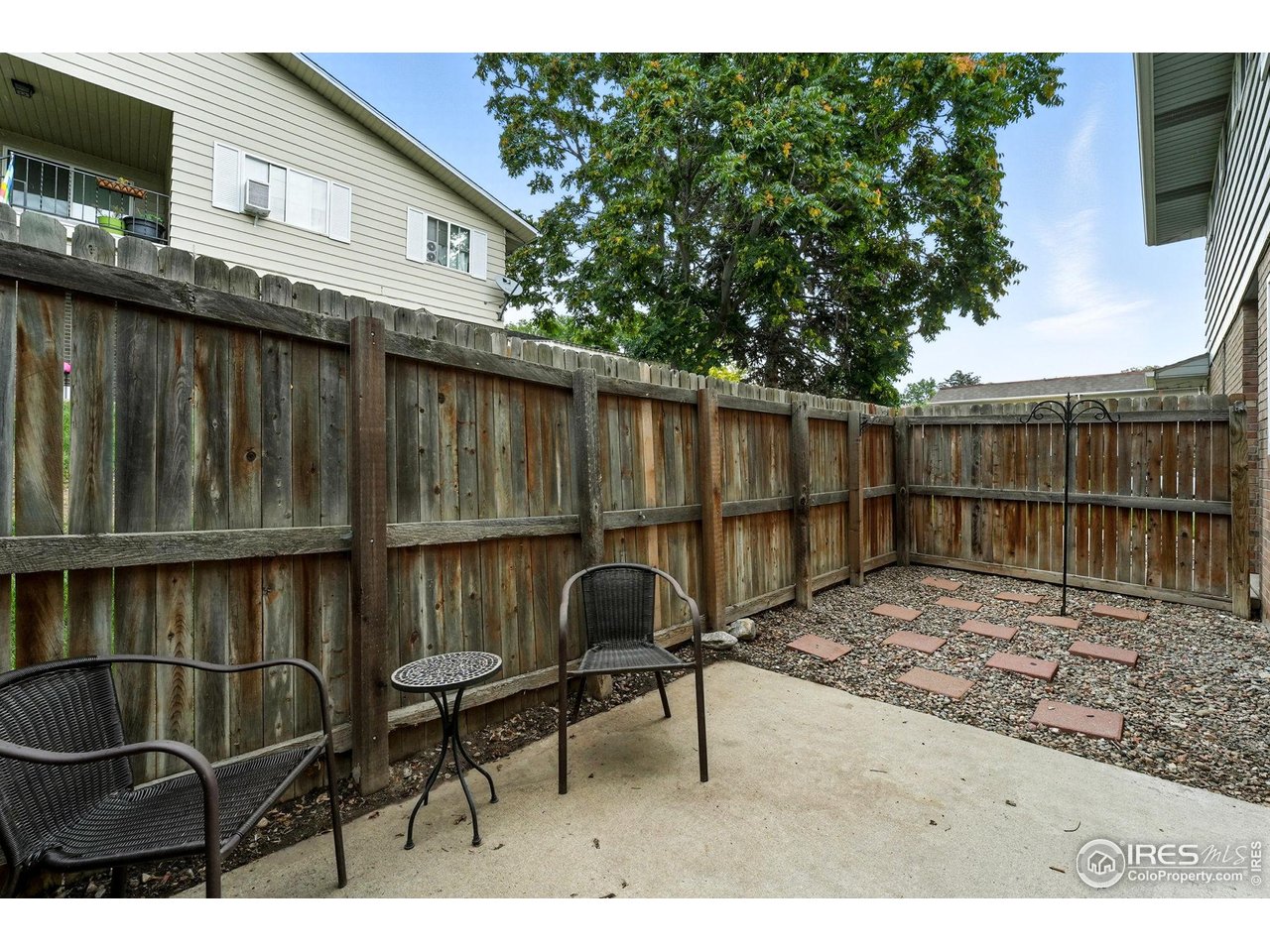 9857 Lane Street Thornton, CO 80260 - Photo 28 of 38 a view of a chairs and table in the balcony