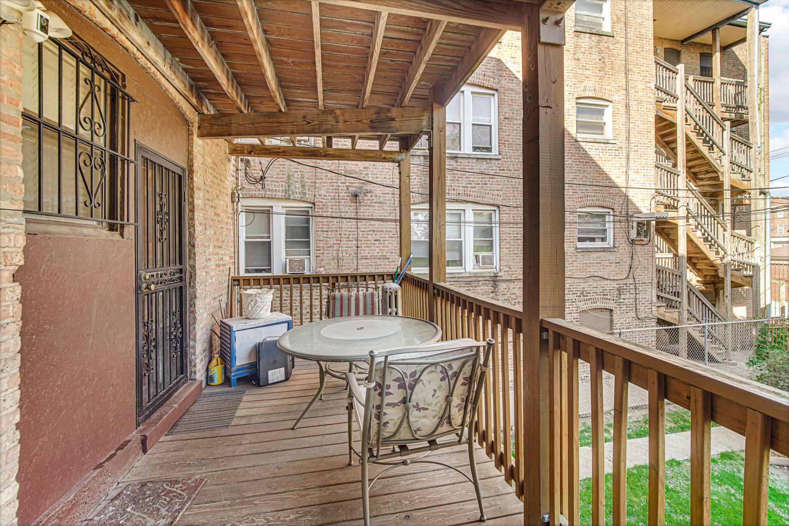 1758 East 72nd Street Chicago, IL 60649 - Photo 17 of 20 a view of a balcony with furniture
