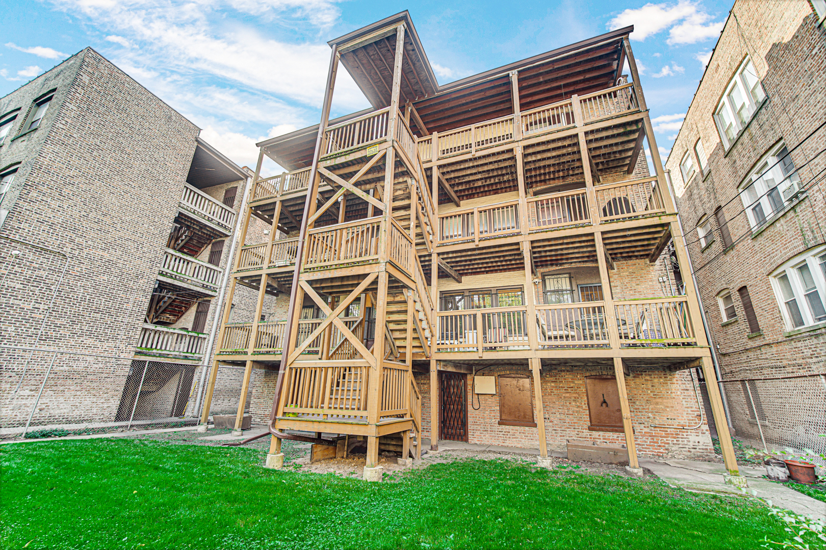 1758 East 72nd Street Chicago, IL 60649 - Photo 20 of 20 front view of a building with a yard