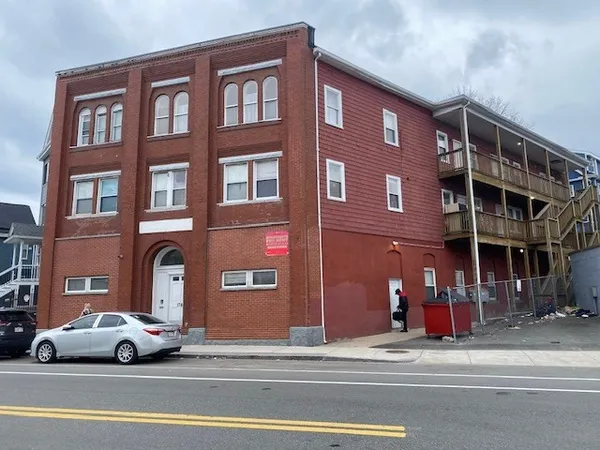 a view of a cars parked in front of a building