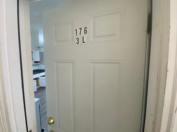 a view of a hallway with closet