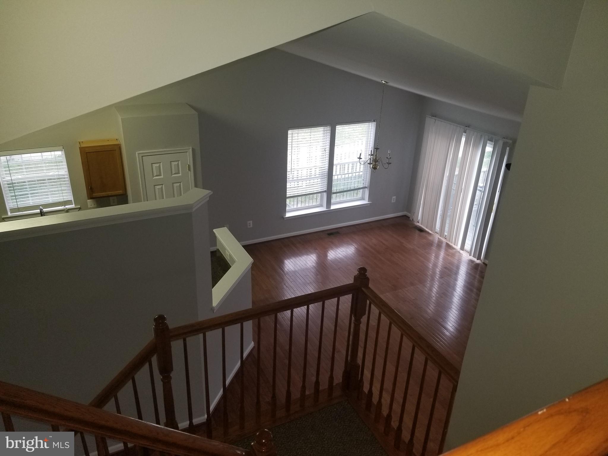 98 Thomas Harmon Drive Camden, DE 19934 - Photo 3 of 21 a view of a hallway with windows
