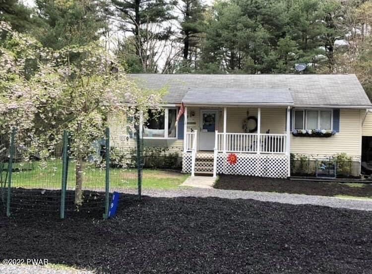 191 Fox Road Dingmans Ferry, PA 18328 - Photo 2 of 27 a view of a house with a back yard
