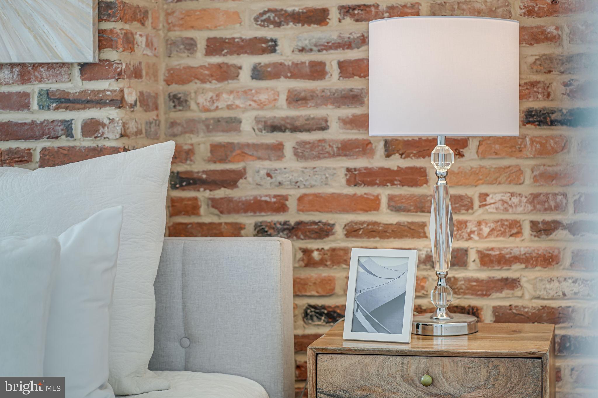106 3rd Street Northeast Washington, DC 20002 - Photo 25 of 63 a bathroom with a sink and a mirror