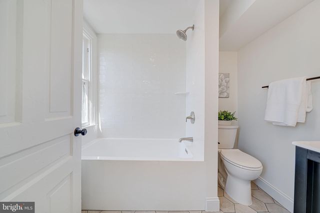 a bed room with a bed and cabinets