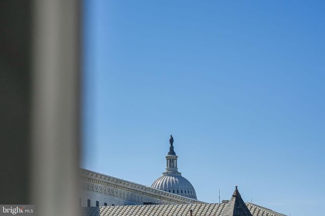 a picture of a book and a white wall