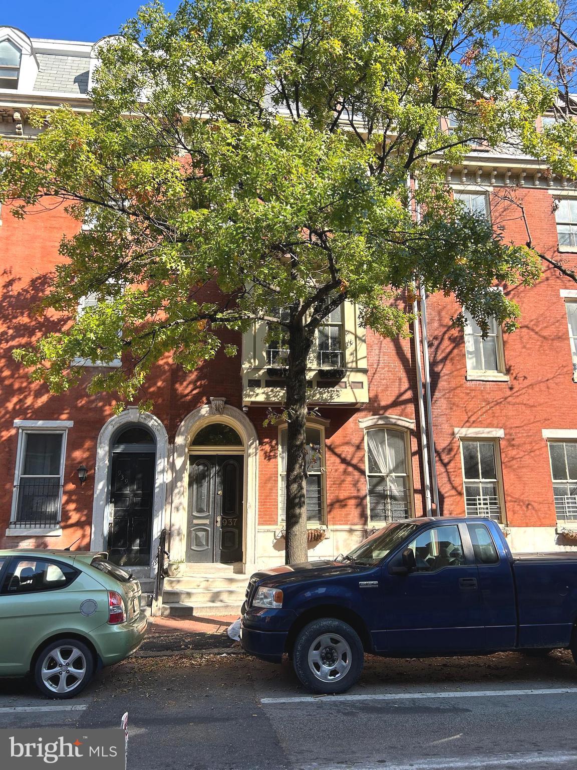 937 Spruce Street Philadelphia, PA 19107 - Photo 1 of 80 a car parked in front of a house