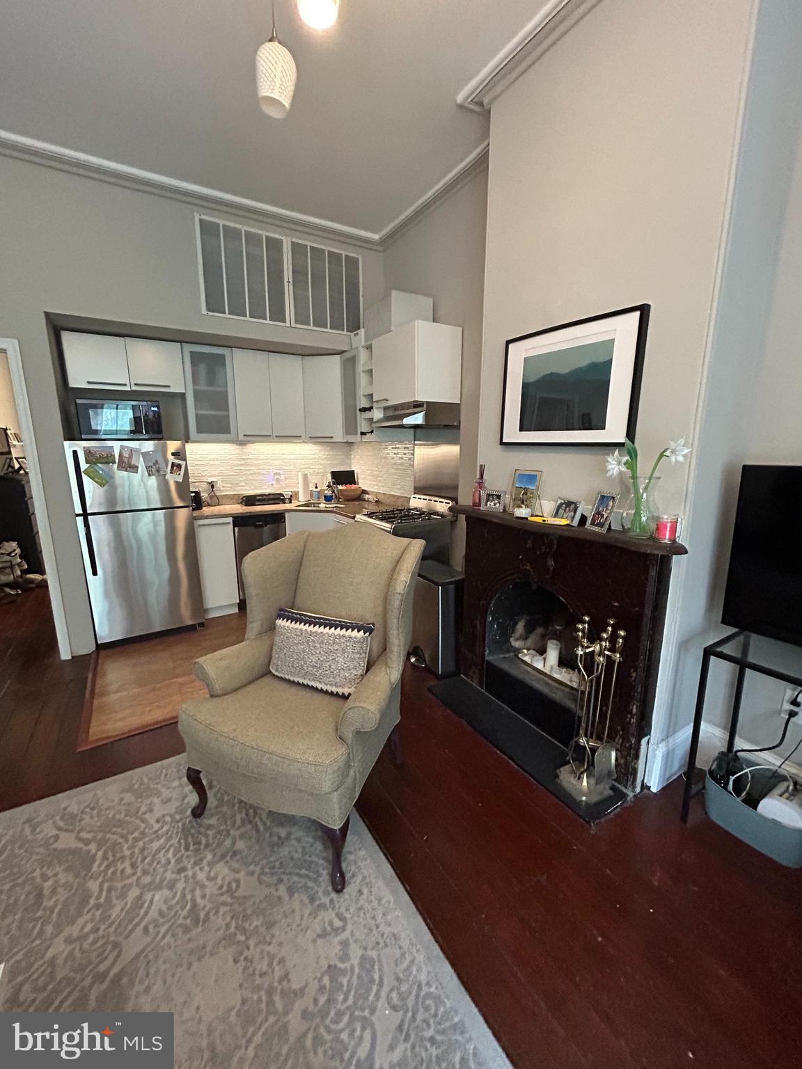 937 Spruce Street Philadelphia, PA 19107 - Photo 11 of 80 a living room with furniture and a flat screen tv
