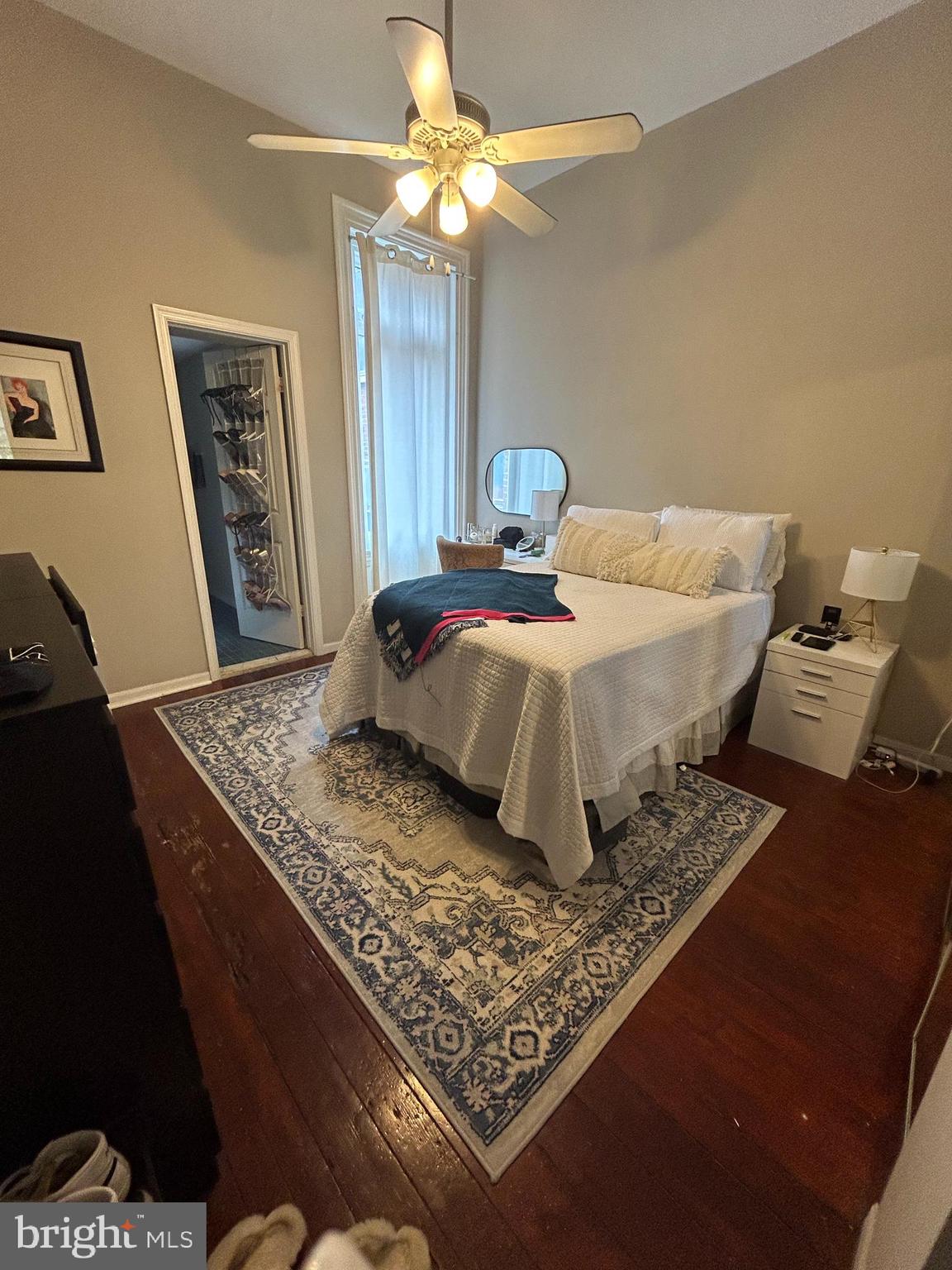 937 Spruce Street Philadelphia, PA 19107 - Photo 15 of 80 a bedroom with a bed and wooden floor