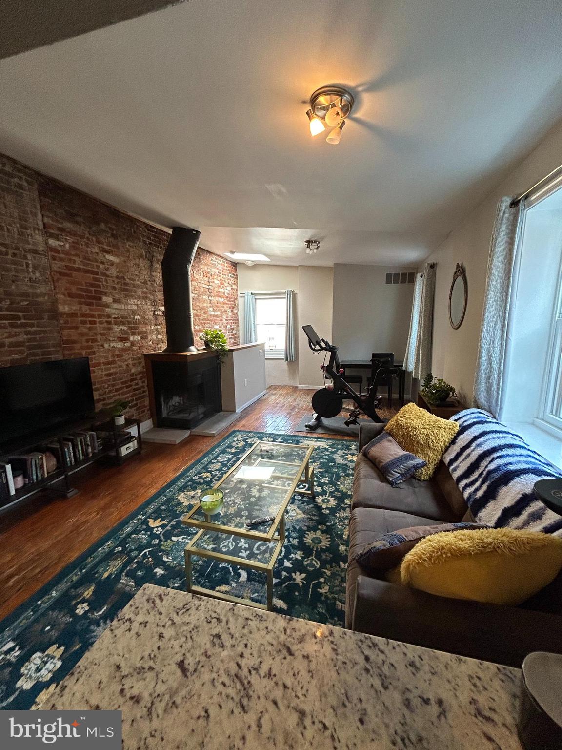 937 Spruce Street Philadelphia, PA 19107 - Photo 35 of 80 a living room with furniture and a flat screen tv