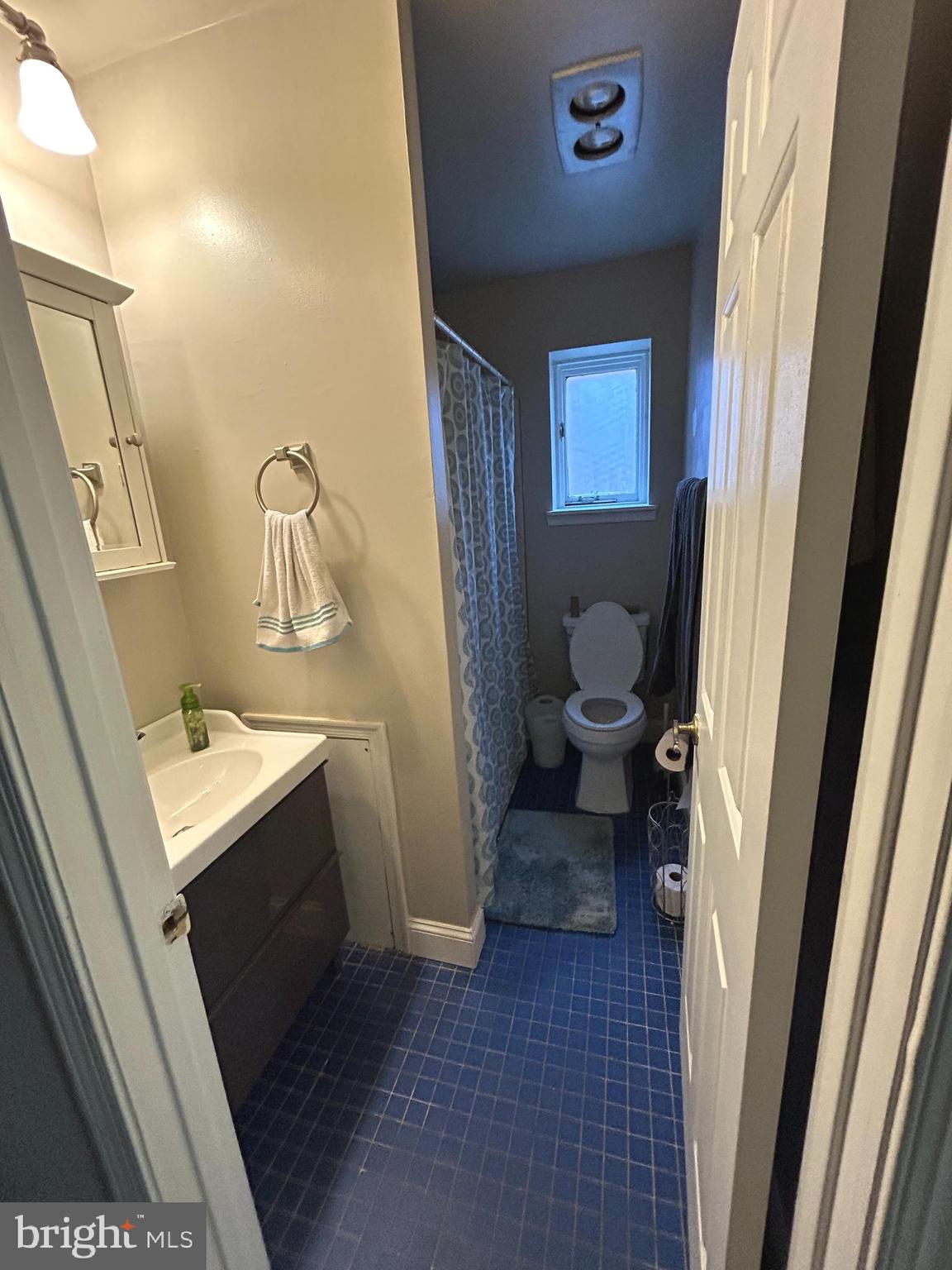 937 Spruce Street Philadelphia, PA 19107 - Photo 41 of 80 a bathroom with a sink a toilet and a mirror