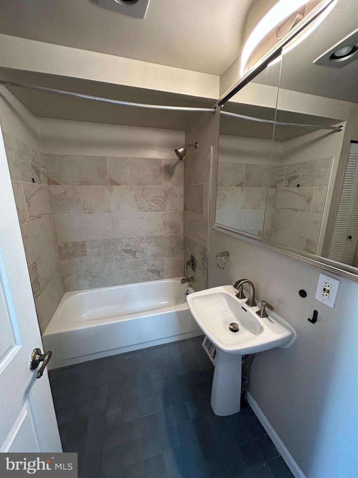 937 Spruce Street Philadelphia, PA 19107 - Photo 53 of 80 a bathroom with a sink a toilet and bathtub
