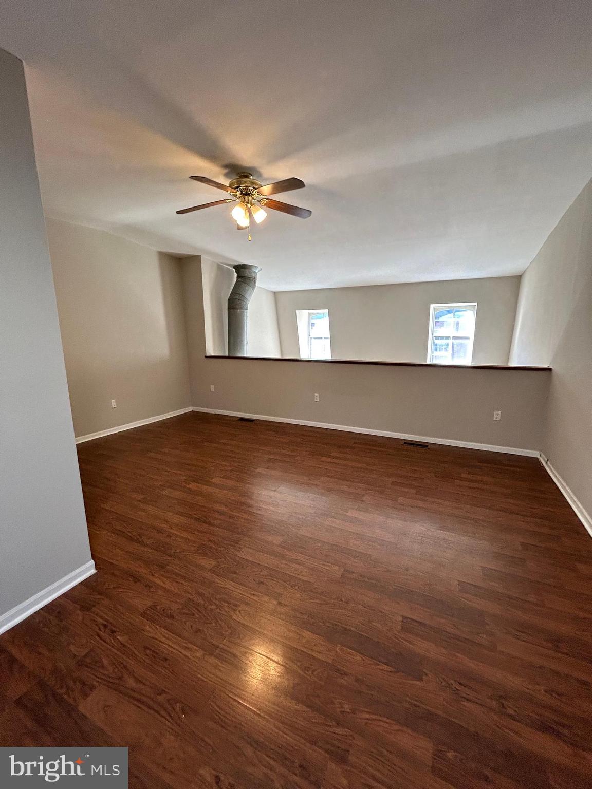 937 Spruce Street Philadelphia, PA 19107 - Photo 61 of 80 a view of empty room with wooden floor and fan