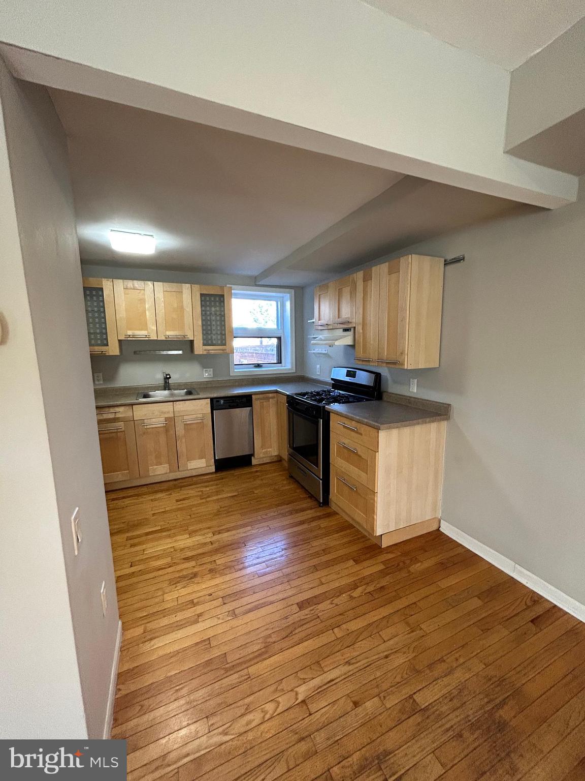 937 Spruce Street Philadelphia, PA 19107 - Photo 67 of 80 a kitchen with stainless steel appliances granite countertop a stove top oven a sink dishwasher and cabinets