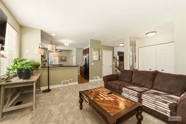 a living room with furniture and a couch