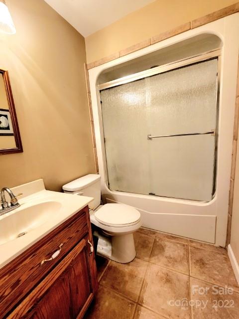 1405 Biggers Cemetery Road Monroe, NC 28110 - Photo 15 of 29 a bathroom with a sink toilet and shower