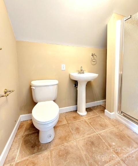 1405 Biggers Cemetery Road Monroe, NC 28110 - Photo 17 of 29 a bathroom with a sink toilet and a mirror