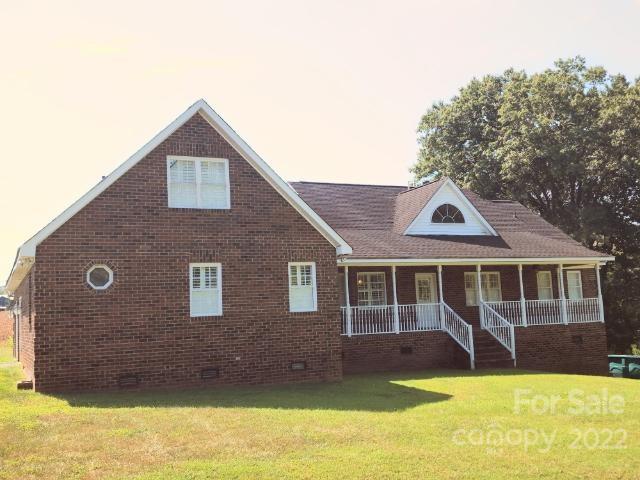 1405 Biggers Cemetery Road Monroe, NC 28110 - Photo 19 of 29 a view of a house with swimming pool