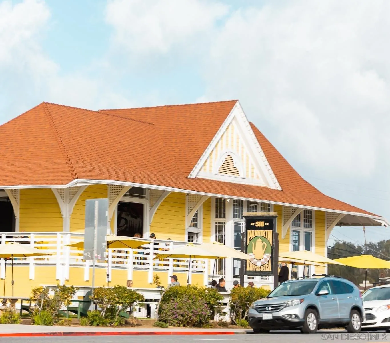 119 Edgeburt Drive Encinitas, CA 92024 - Photo 19 of 24 a front view of a residential apartment building with a yard