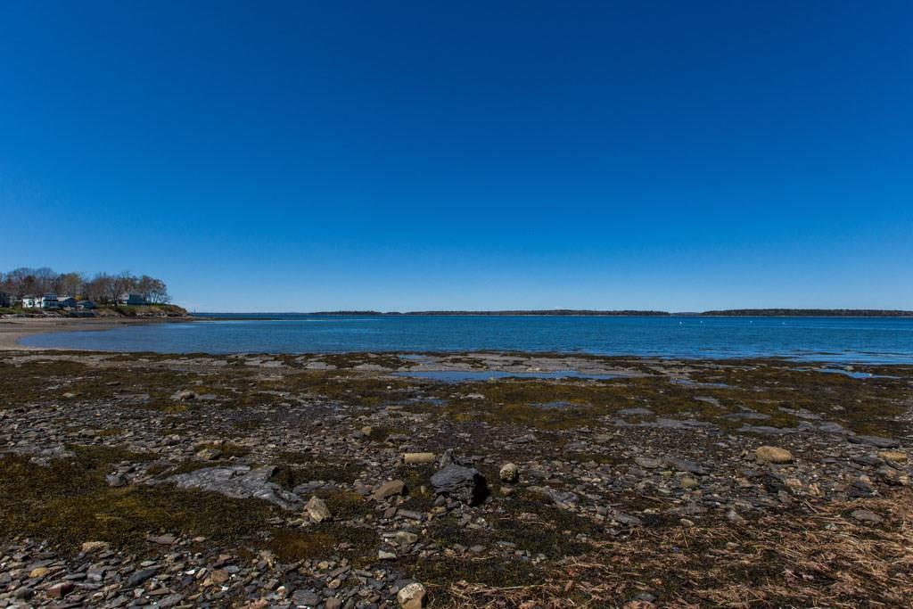 Stroll on the pebble beach at low...