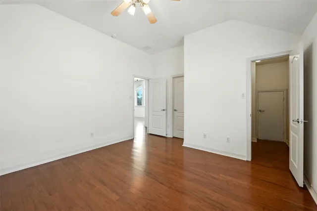 a front view of a house with a yard and outdoor seating
