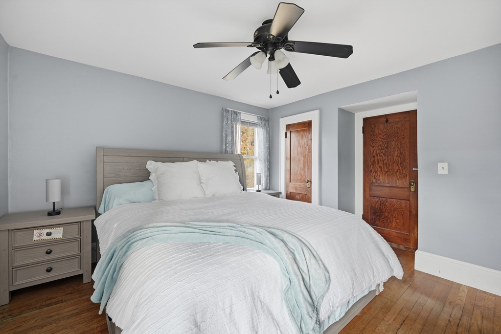 572 Springfield Street Chicopee, MA 01013 - Photo 36 of 42 a large bed sitting in a bedroom next to a window